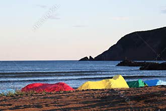 Painted rocks on the beach at Branch, Newfoundland