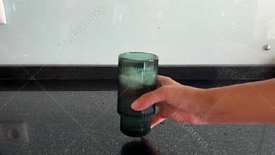 Swirling Ice Cubes in Glass with Crisp Clinking Sound