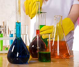 School children doing chemistry science experiment