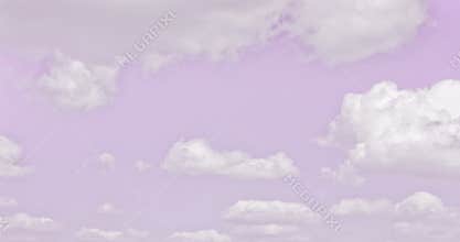 Drifting clouds in purple sky