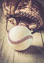 Old and worn used leather baseball sport glove over aged