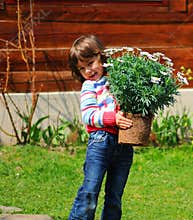 Girl planting daisies