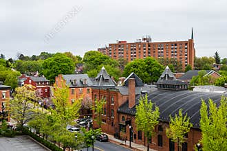 Aerial of historic downtown Lancaster, Pennsylvania with blooming trees
