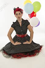 Young beautiful woman in retro dress