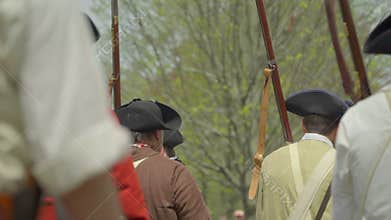 Revolutionary War soldiers fire at British lines