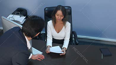 Business colleagues arguing in office