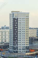 Modern and new apartment building. Multistoried modern, new and stylish living block of flats.