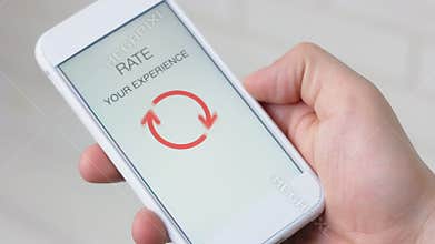 Man gives one star rating using smartphone application