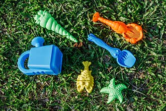 Kids colorful sand toys , shovel, star, palm molds Put on the l