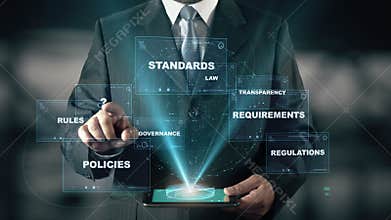 Businessman with Compliance hologram concept