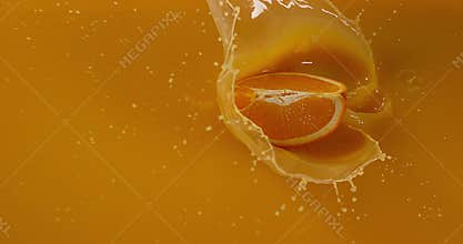 Orange, citrus sinensis, fruit falling into orange juice,