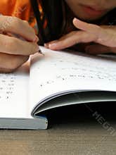 Young Chinese girl studying