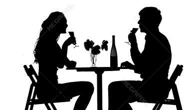 Romantic couple having dinner, clinking glasses
