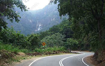 Road through a jungle to Rawana Ella falls