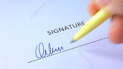 Male Hand Signing Signature
