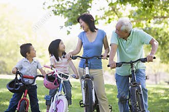 Grandparents bike riding with grandchildren