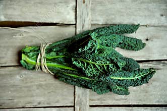 Alkaline, healthy food : kale leaves on a vintage background