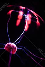 Hand and plasma ball flames on a black background