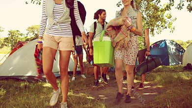 In high quality 4k format excited friends arriving at music festival