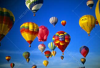 Hot air balloons agaisnt blue sky
