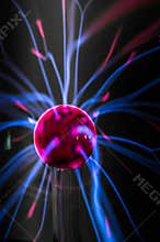 Plasma ball with magenta-blue flames