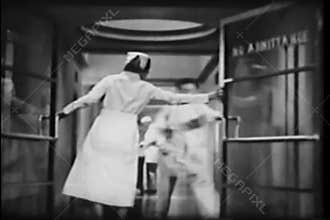 Nurse and doctor admitting patient into surgery