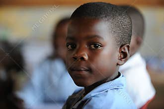 African School boy in class