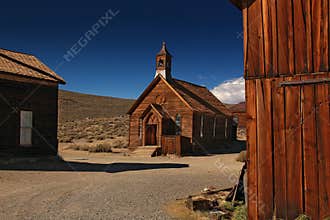 Wooden church in ghost town Bodie with blues sky