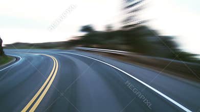 Speeding on winding coastal road