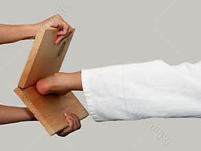 Karate kick breaking board