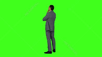 Businessman standing and thinking