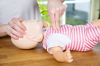 Baby CPR one hand compression