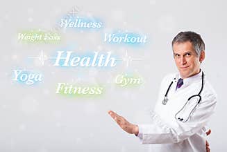 Clinical doctor pointing to health and fitness collection of words