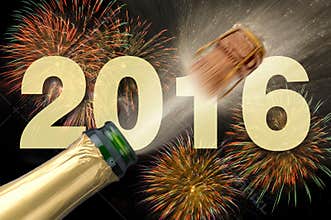 Happy new year 2016 with popping champagne
