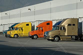 Big Rigs at Warehouse Loading Dock