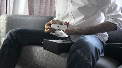 Fast motion - unboxing of Apple TV