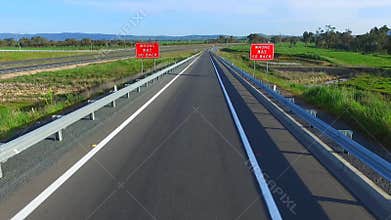 Wrong way or turn go back road signage bad choice