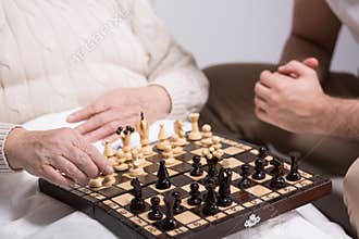 Carer playing with resident