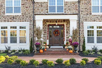 Front door, horizontal view of front door with seasonal decor