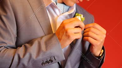 Bridegroom preparing for the wedding