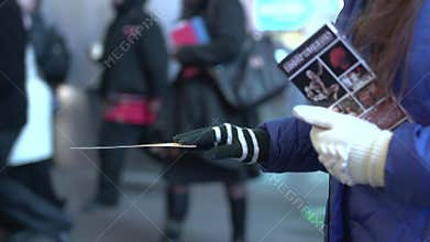 Passing flyers on an NYC sidewalk (1 of 1)