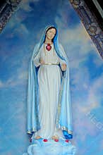 Devote Mary in little chapel