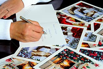 Writing Christmas cards.