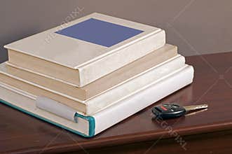 Car key and school books 2