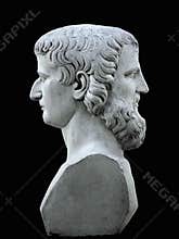 Janus sculpture on a black background