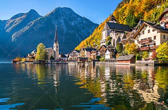 Sunrise in Hallstatt mountain village with Hallstatter See in fall, Austria