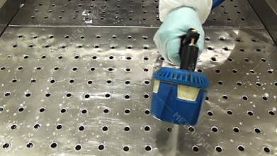 Cleaning the tray of frozen fish