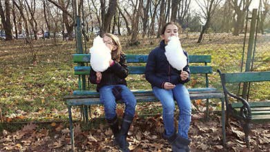 Girls eating cotton candy