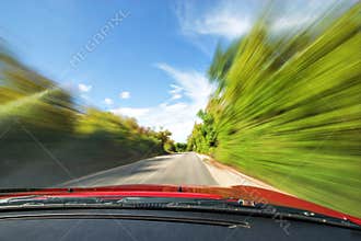 Fast Sport Car Driving in Nature Freeway