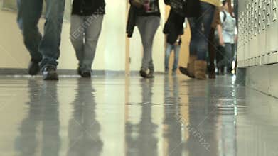 Middle school students walking down hallway (2 of 2)